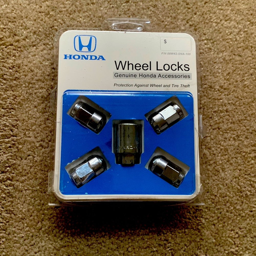 COPY - Honda Wheel locks. Genuine Accessory.